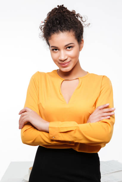 istock Amazing young curly african lady standing over white background 1350886302