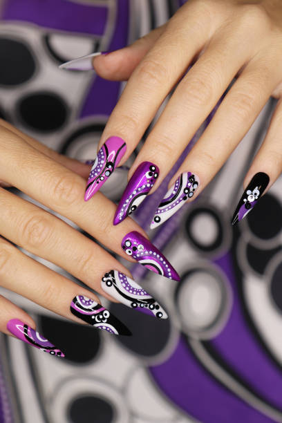Manicure on long nails. Manicure on long nails with dots and lines. Nail Art Designs stock pictures, royalty-free photos & images