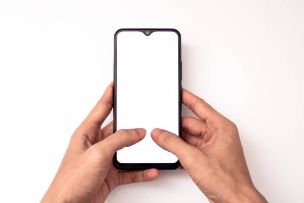 istock hand holding a phone on a white background 1350887484