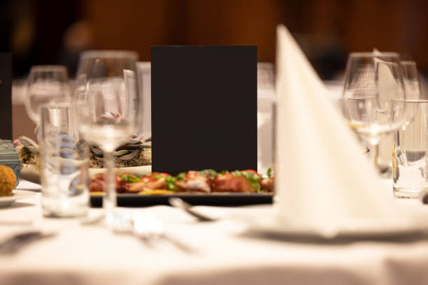 menu card on fine dining table empty menu card on fine dining table ready for your design. restaurant table card stock pictures, royalty-free photos & images