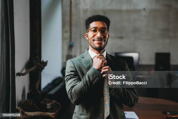 Portrait Of A Young Adult Businessman In His Office Stock Photo - Download Image Now