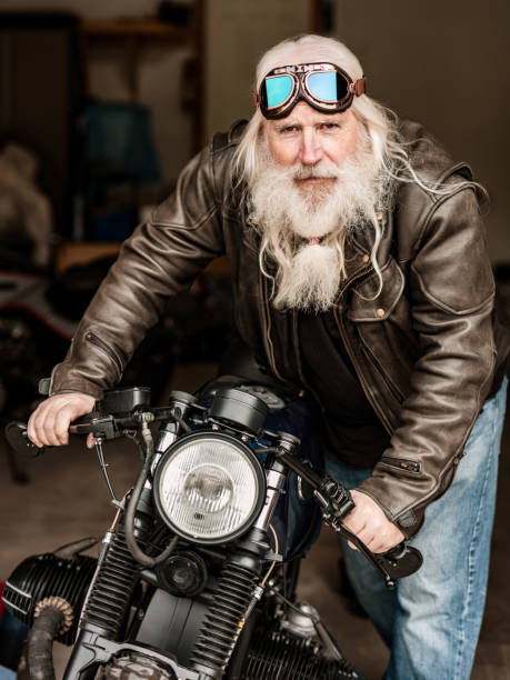 istock Senior man working on his motorcycle 1350895228