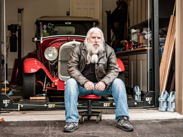 istock Senior man working on his vintage car 1350895283