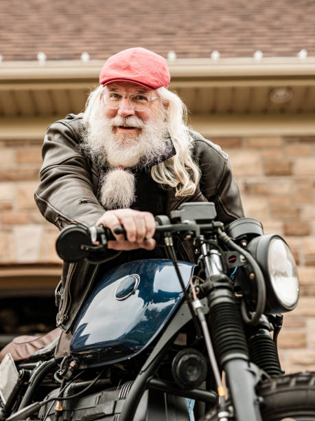 istock Senior man working on his motorcycle 1350895284