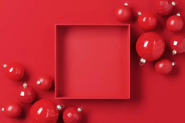 Photo of Blank red open paper box with Christmas balls on red paper background. 3d render, background for product and design.