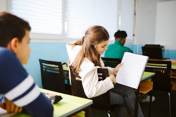 istock Children studying the high school classroom 1350898123