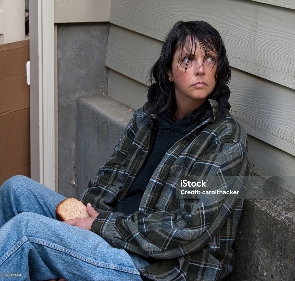 homeless woman Homeless woman sitting in stair well. See similar images here: 40-44 Years Stock Photo