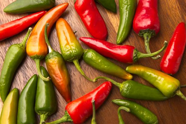 istock Peppers at vaious stages of ripening. 1350905627