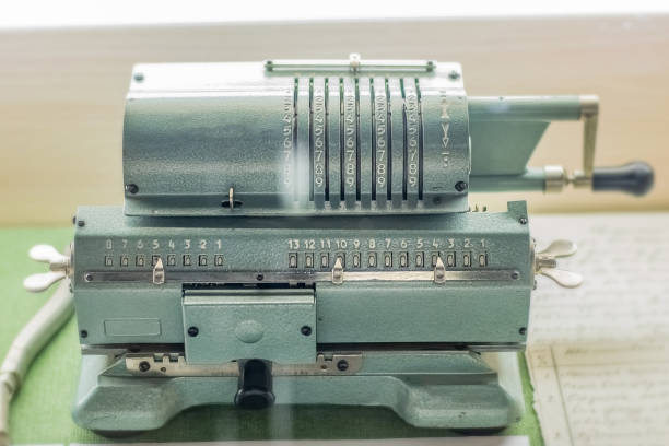 istock Vintage calculator old calculating machine 1350906766