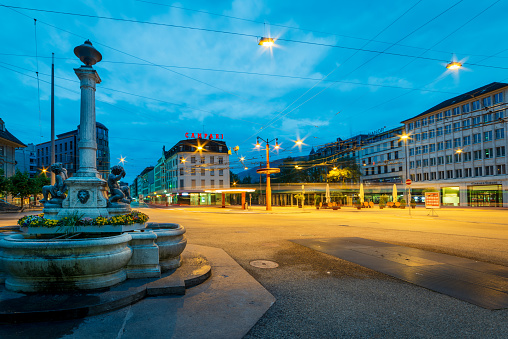 Milan, Italy - August 13, 2023: street view of Milan at night, the famous Teatro alla Scala is visible.