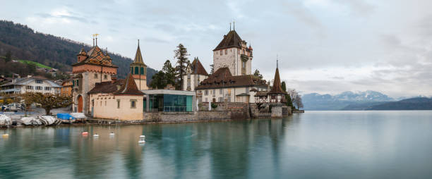 panorama view of the famous swiss castle oberhofen on lake thun - thun switzerland facade european culture imagens e fotografias de stock