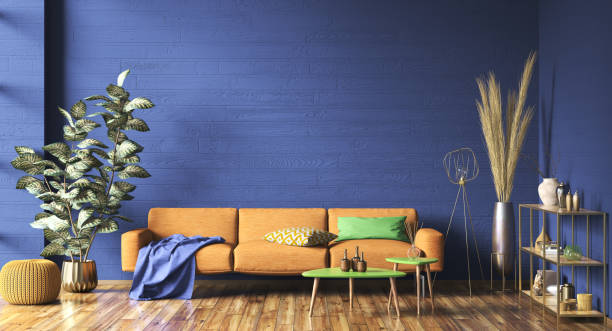 istock Interior with orange sofa in modern living room with blue mockup wall, home design 3d rendering 1350911313