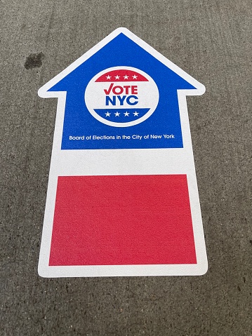 New York, NY USA - November 2, 2021: New York City, Vote NYC Arrow Sticker Outside Voting Station in Manhattan