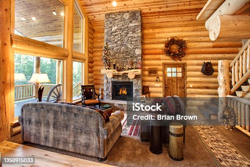 istock Luxurious log cabin interior 1350915033