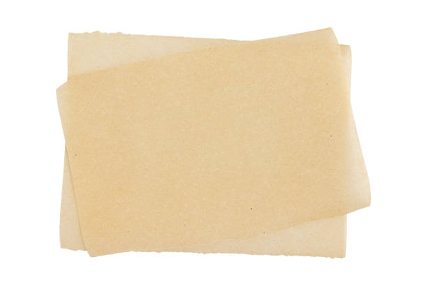 istock parchment for baking culinary, isolated on white background, top view 1350919277
