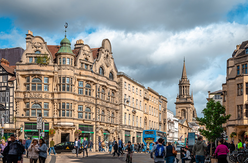 Oxford, UK - September 21 2018: The junction of High street, Queen st, St Aldates and Cornmarket street in the inner city. The Lloyds bank building dominates the picture.