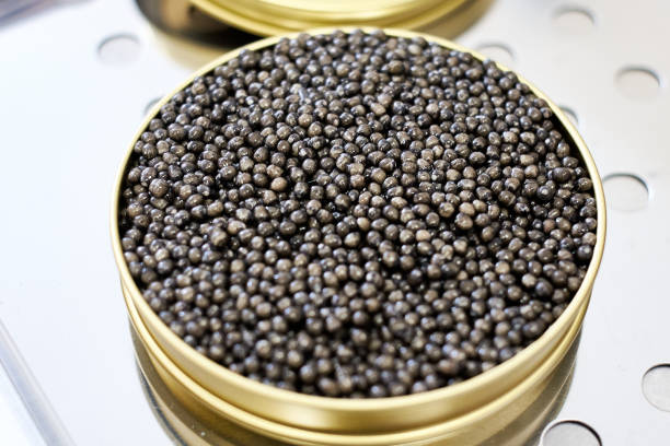istock Black caviar close up isolated black background 1350922179