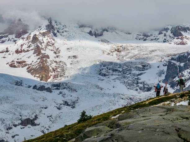 istock The Skiers and Mount Rainier 1350923561