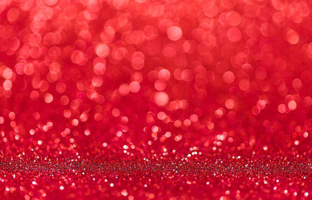 istock Christmas red color abstract glitter texture background. 1350924894