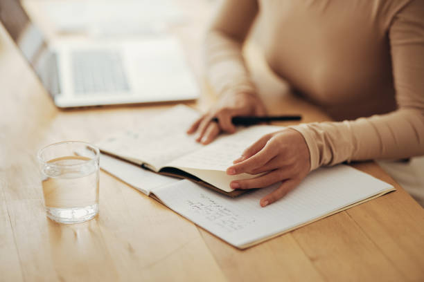 An Anonymous Business Woman Working from Home Office