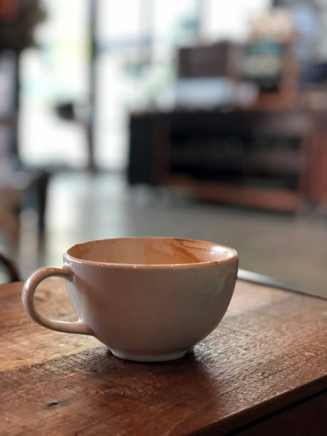 istock Hot coffee cup on wooden table in coffee shop 1350926605