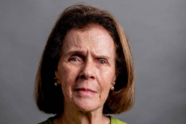 istock Serious Senior woman looking at the camera 1350927334