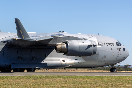 Avalon, Australia - February 25, 2013: United States Air Force (USAF) Boeing C-17A Globemaster III military transport aircraft from the 535th Airlift Squadron taxiing at Avalon Airport.
