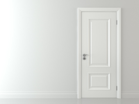 Elegant wooden door in empty room with copy space