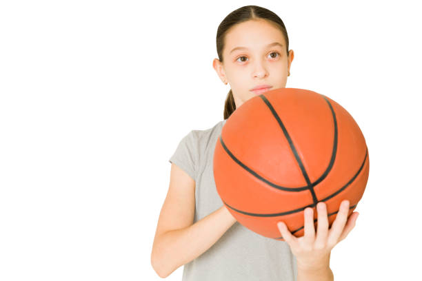 istock Active preteen playing basketball 1350933259