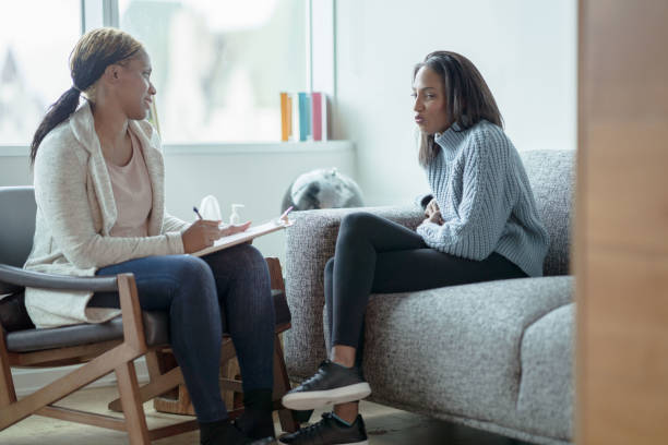 istock Sitting in a Counselling Appointment 1350942265