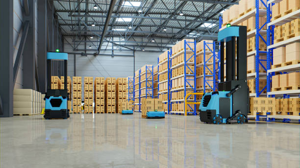 istock Forklift Truck AGV robots efficiently sorting hundreds of parcels per hour(Automated guided vehicle) AGV. 1350949714