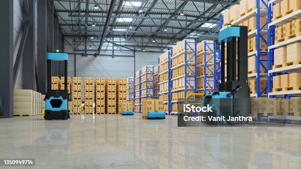 Forklift Truck Agv Robots Efficiently Sorting Hundreds Of Parcels Per Hour Agv Stock Photo - Download Image Now