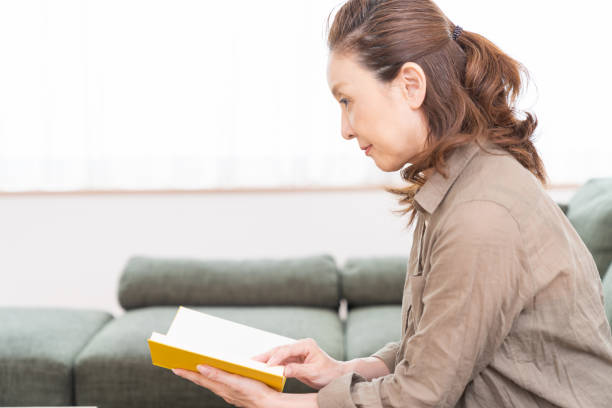 istock senior age woman who reads a book 1350953015