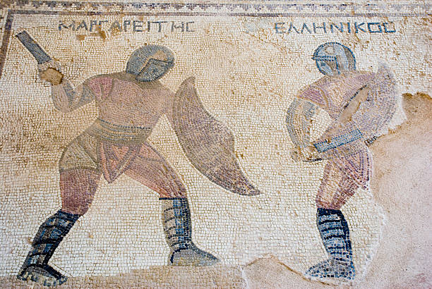 Roman mosaic A roman mosaic showing two gladiators fighting. kourion stock pictures, royalty-free photos & images