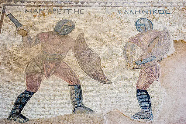 A roman mosaic showing two gladiators fighting.