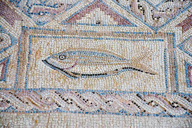 A Roman mosaic showing a fish on the island of Cyprus. The mosaic is on a ancient site believed to be over 2000 years old.