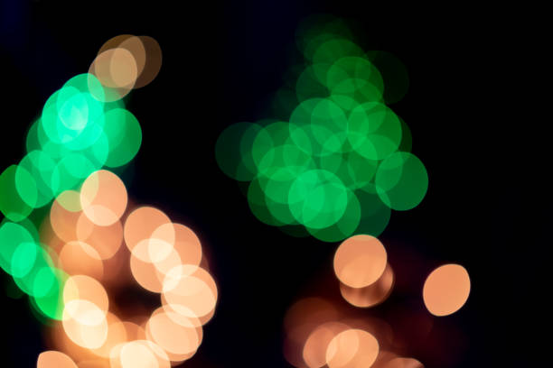 istock Christmas bokeh light on black background, abstract. 1350959018