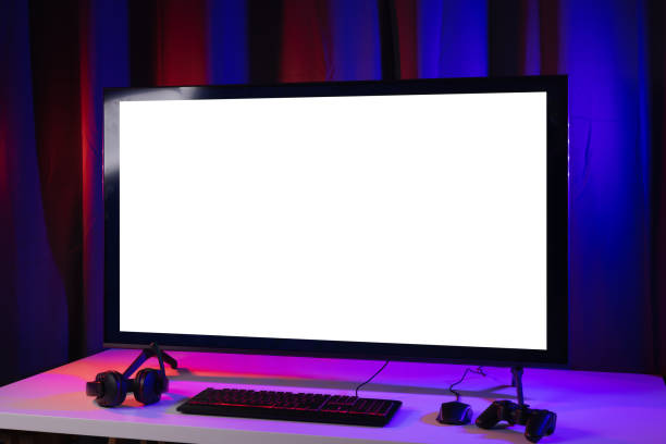 istock Blank screen display computer pc with gaming gear joystick mouse keyboard mouse. Gamer gadget background in game station. 1350960567