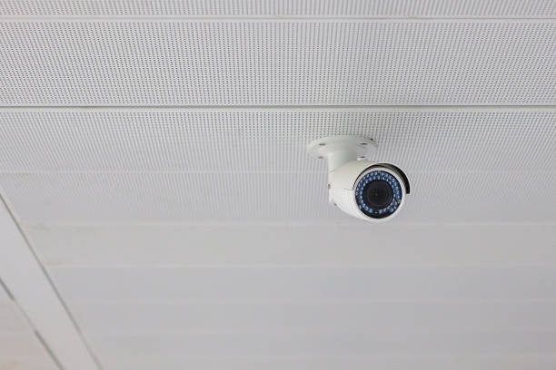 istock Modern Security Camera with office or house background, cctv to record and property protection for car park 1350960743