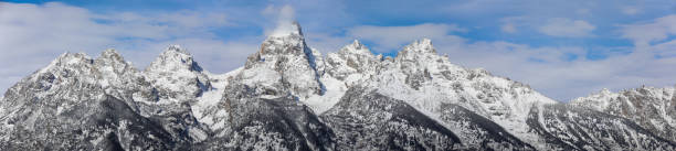 Panoramic view of the dramatic peaks of Grand Teton National Park stock photo