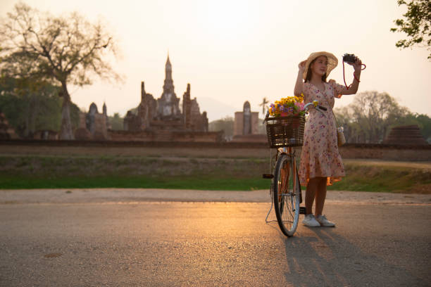 istock Asian tourists is visiting at Sukhothai in Thailand. 1350968029