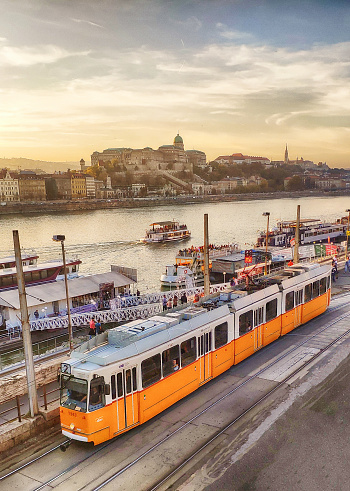 Aerial view of typical yellow tram beside the Danube River in Budapest, Hungary