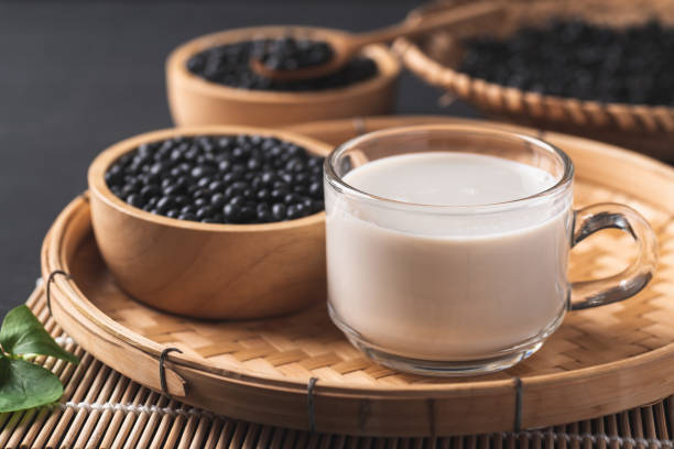istock Black soy bean seeds and soy milk 1350973960