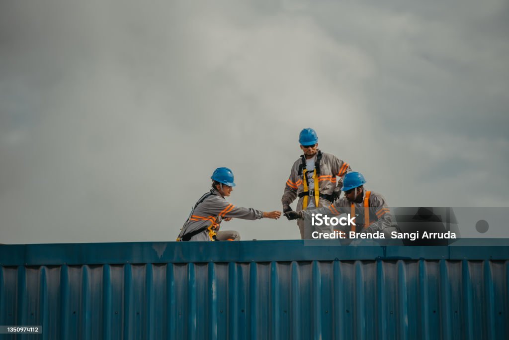 People Installing People Working On Installing Solar Panels Stock Photo - Download Image ...