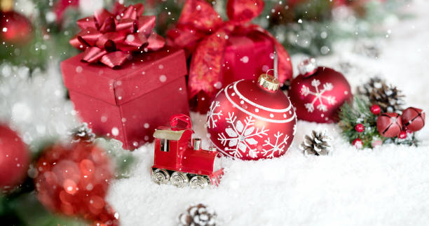 istock Christmas Gifts and Baubles on a Red Background 1350974162