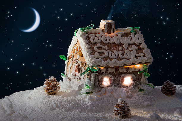 istock Snowy gingerbread home and moon at night in winter 135097629