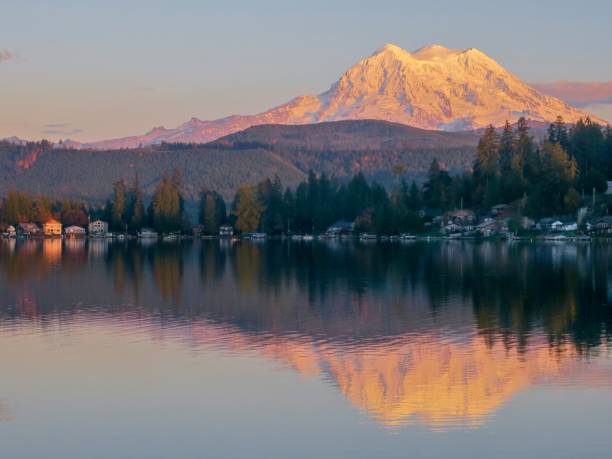 istock Majestic Mount Rainier and Her Reflection in Clear Lake at Sunset 1350980770