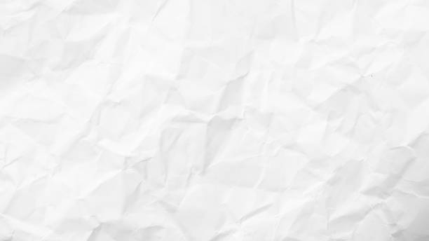 istock White Paper Texture background. Crumpled white paper abstract shape background with space paper recycle for text 1350985301