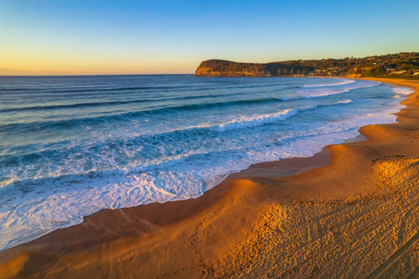 istock Surfs up aerial sunrise seascape 1350986900