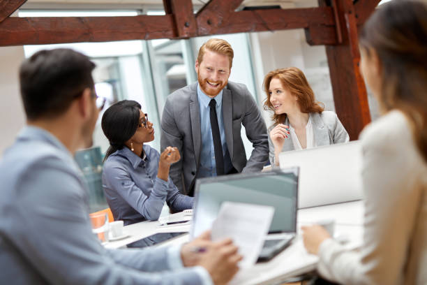 istock Business partners discussing documents and ideas during business meeting 1350987903